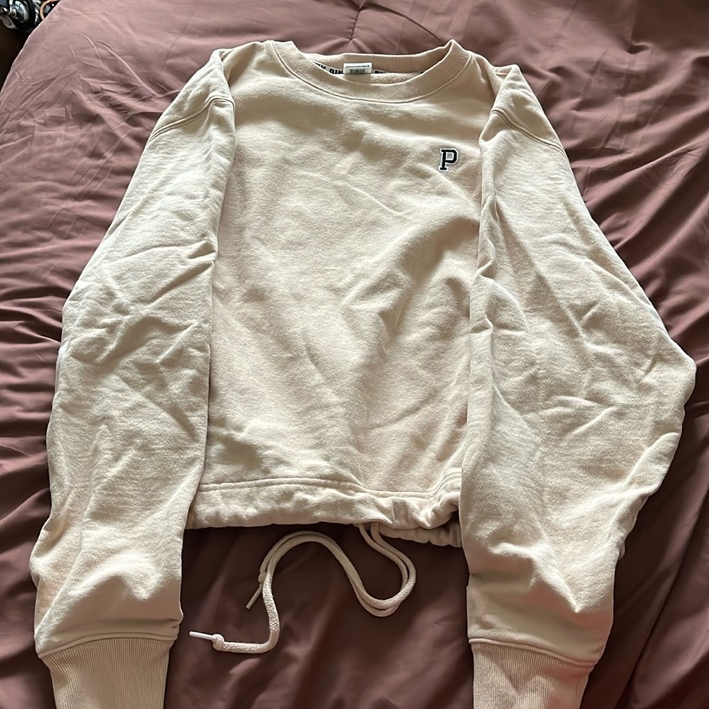 Pink brand sweatshirt.